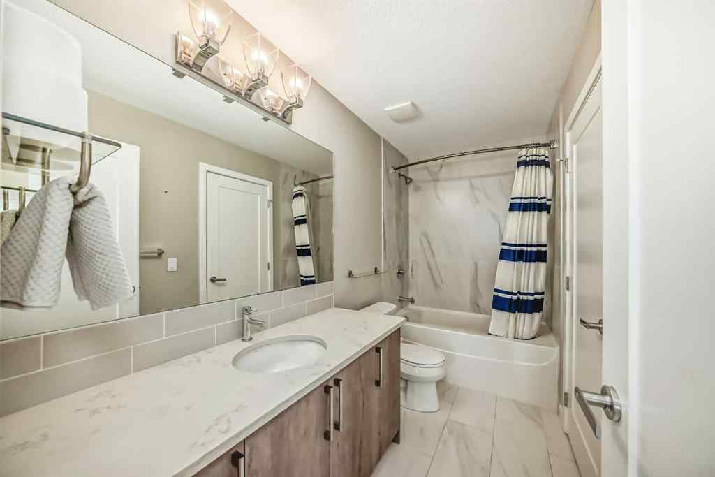 MLS® A2267424 - Unit #312 8530 8A Avenue SW in West Springs Calgary, Residential