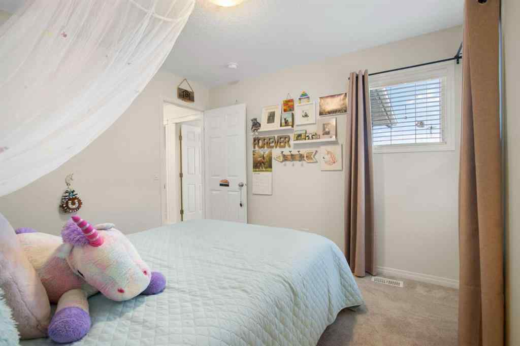 MLS® A2267426 - 68 Thoroughbred Boulevard  in Heartland Cochrane, Residential