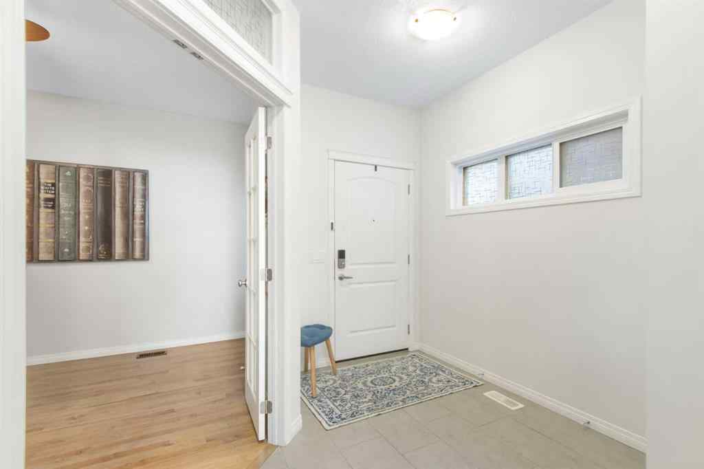 MLS® A2267426 - 68 Thoroughbred Boulevard  in Heartland Cochrane, Residential