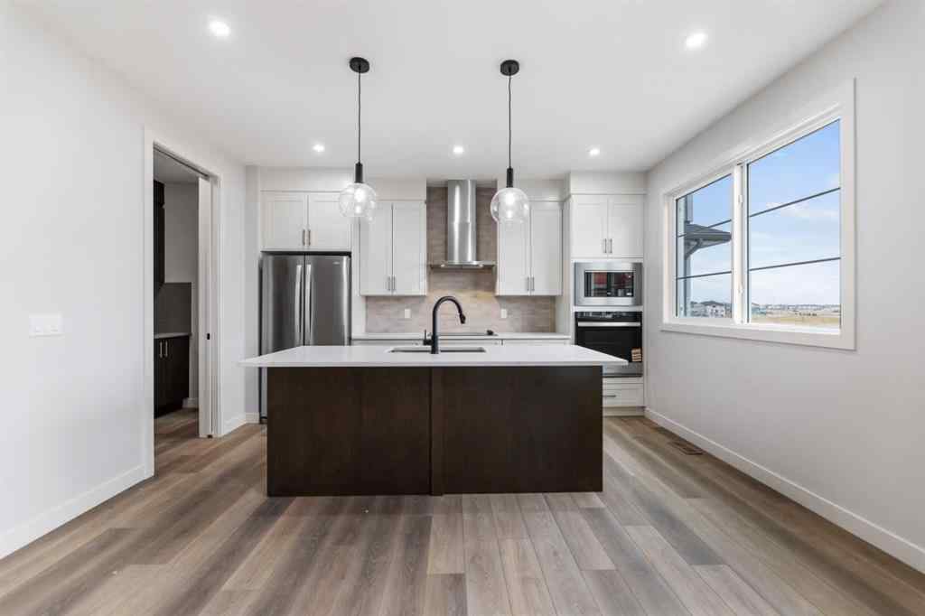 MLS® A2267443 - 284 Savanna Drive NE in Saddle Ridge Calgary, Residential