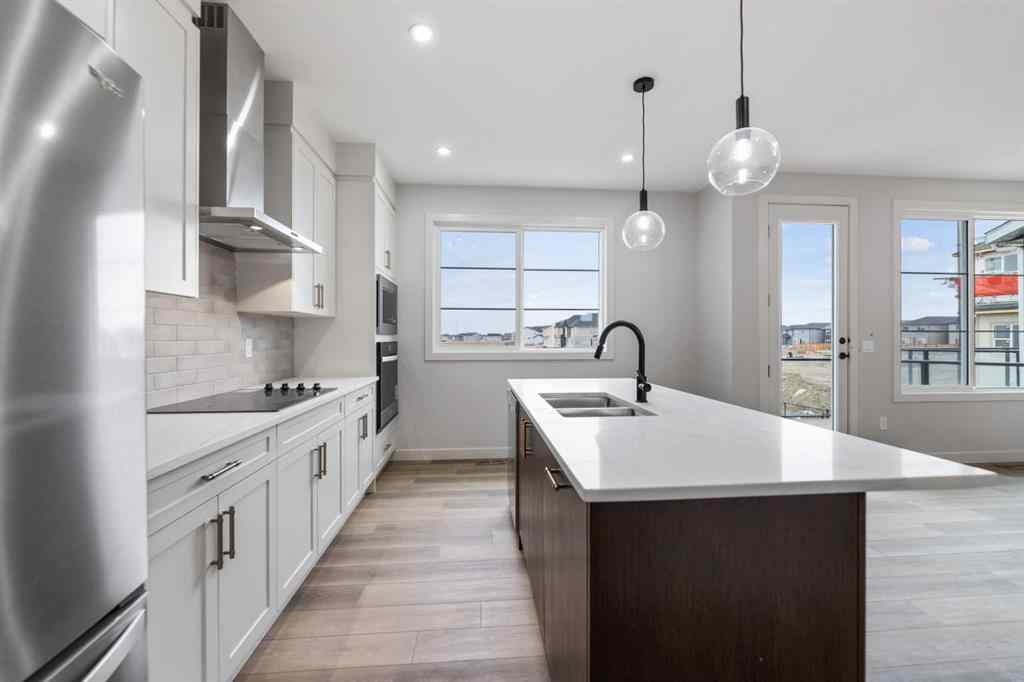 MLS® A2267443 - 284 Savanna Drive NE in Saddle Ridge Calgary, Residential