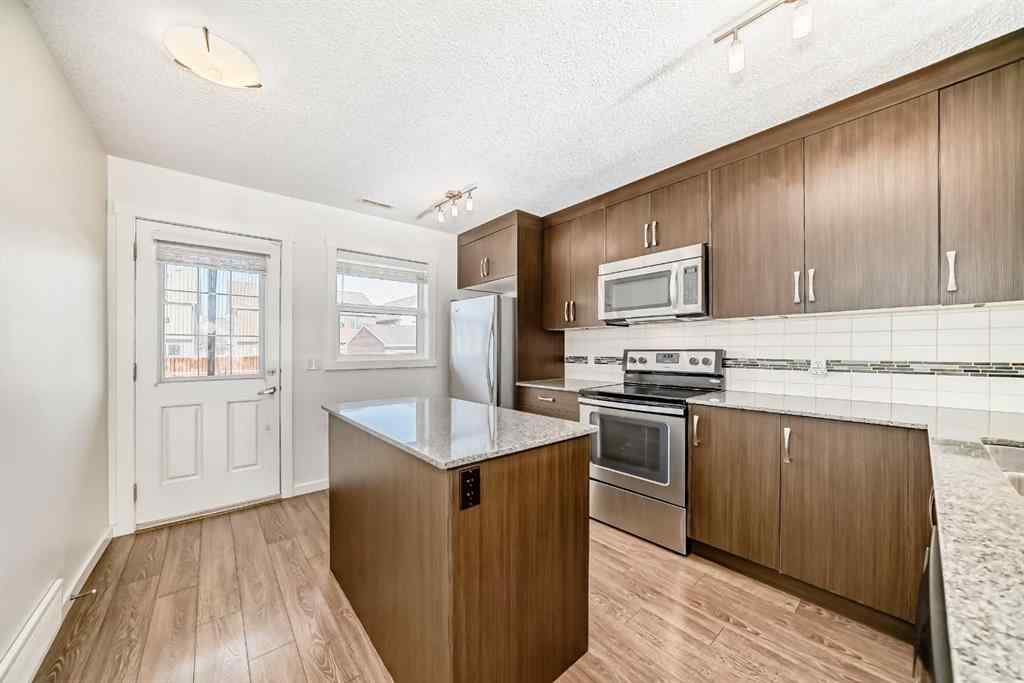 MLS&reg; # A2267444 - 1219 Auburn Bay Circle SE in Auburn Bay Calgary, Residential Open Houses