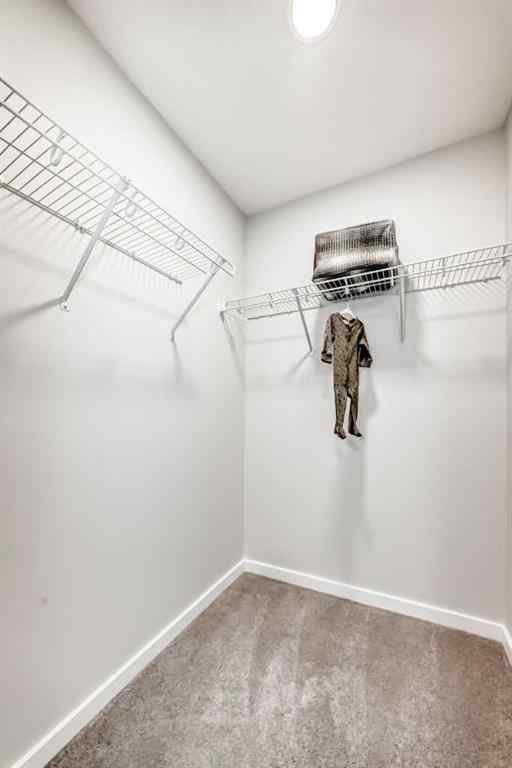 MLS® A2267454 - 50 Walgrove Bay SE in Walden Calgary, Residential