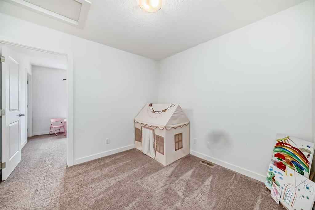 MLS® A2267459 - Unit #208 15 Evanscrest Park NW in Evanston Calgary, Residential