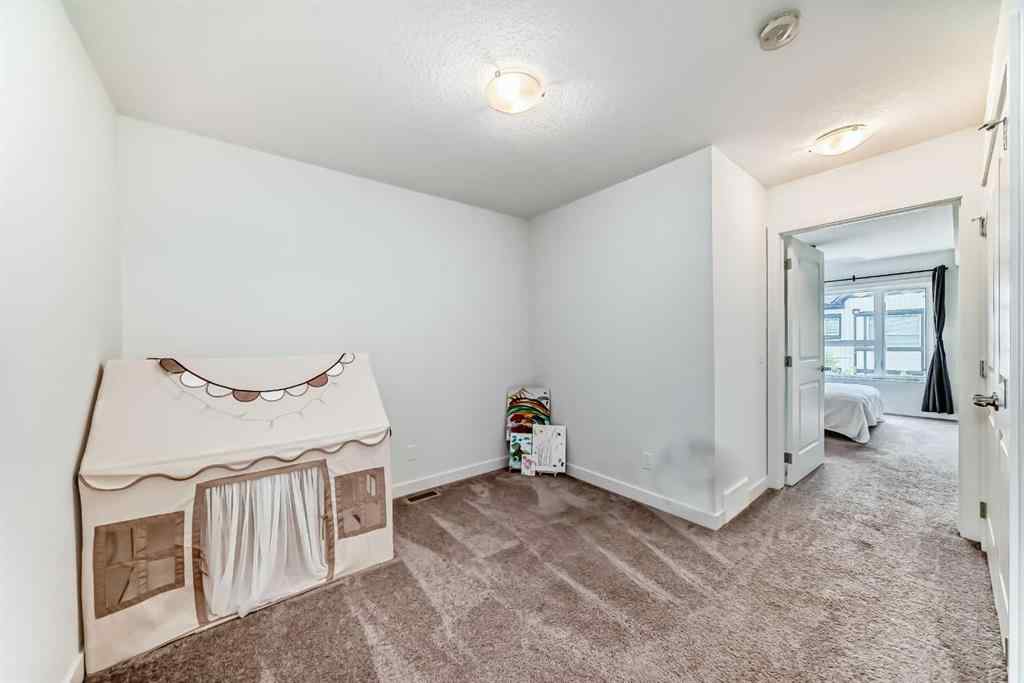 MLS® A2267459 - Unit #208 15 Evanscrest Park NW in Evanston Calgary, Residential