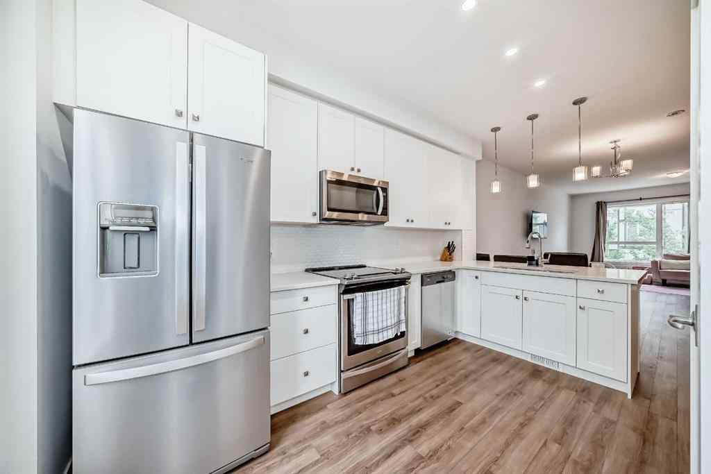 MLS® A2267459 - Unit #208 15 Evanscrest Park NW in Evanston Calgary, Residential