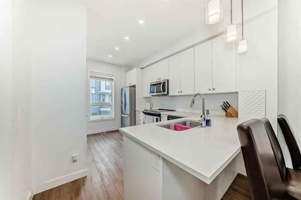 MLS® A2267459 - Unit #208 15 Evanscrest Park NW in Evanston Calgary, Residential