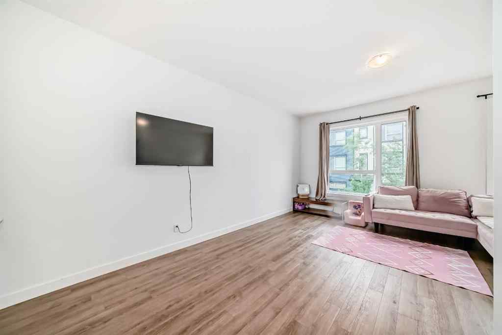 MLS® A2267459 - Unit #208 15 Evanscrest Park NW in Evanston Calgary, Residential