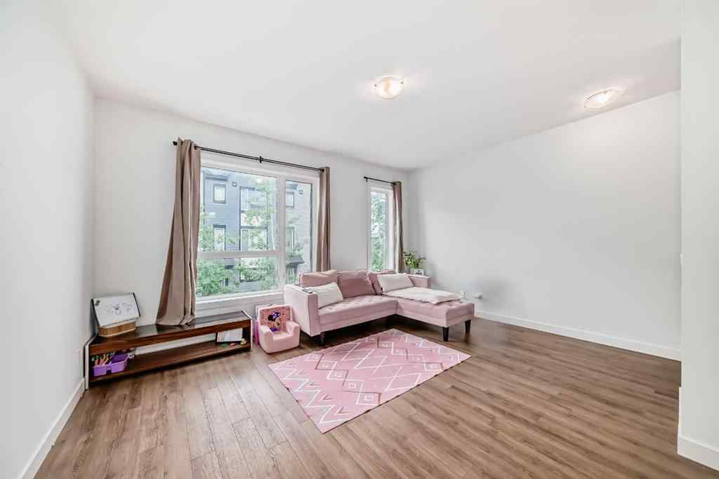 MLS® A2267459 - Unit #208 15 Evanscrest Park NW in Evanston Calgary, Residential