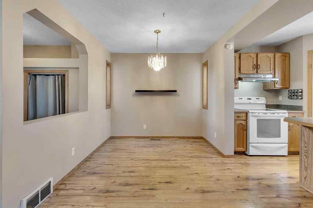 MLS® A2267461 - 87 Coventry Road NE in Coventry Hills Calgary, Residential