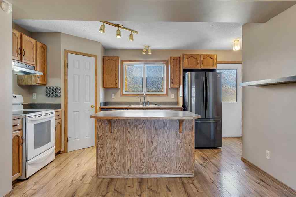 MLS® A2267461 - 87 Coventry Road NE in Coventry Hills Calgary, Residential