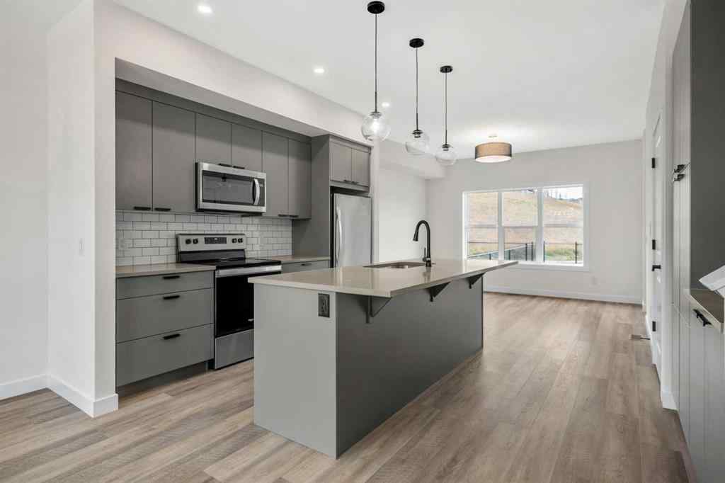 MLS® A2267465 - Unit #1206 525 River Heights Drive  in River Heights Cochrane, Residential