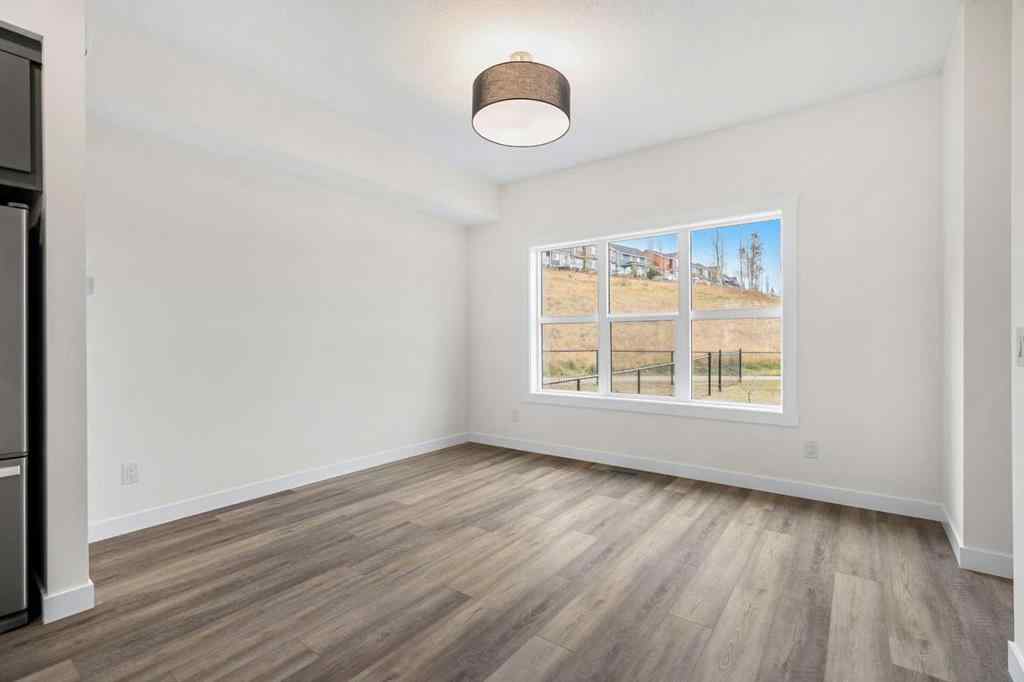 MLS® A2267465 - Unit #1206 525 River Heights Drive  in River Heights Cochrane, Residential