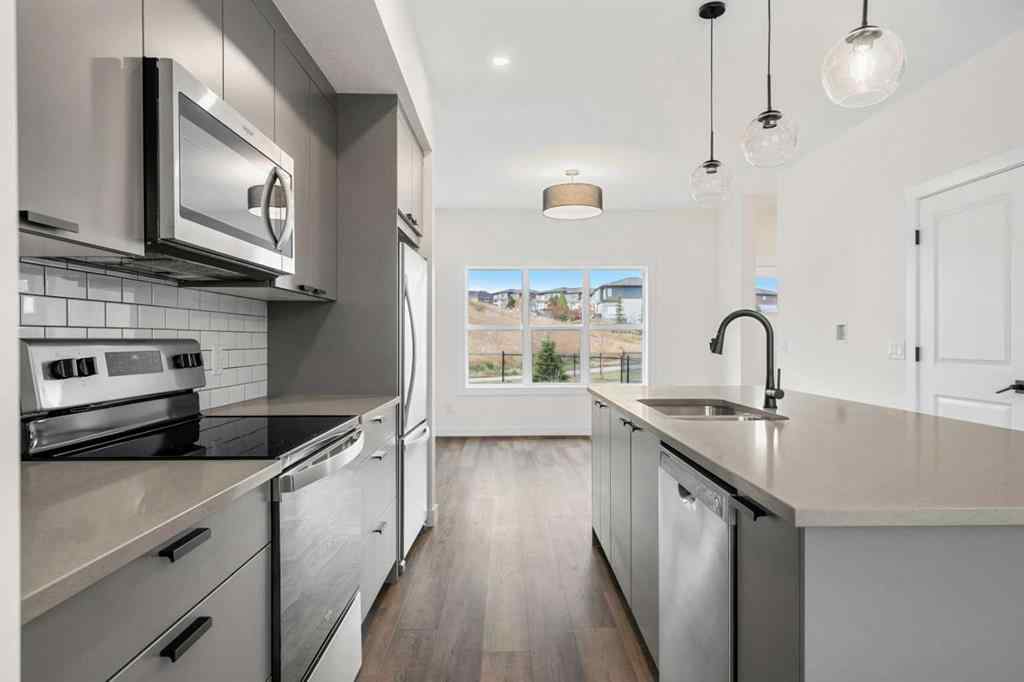 MLS® A2267465 - Unit #1206 525 River Heights Drive  in River Heights Cochrane, Residential