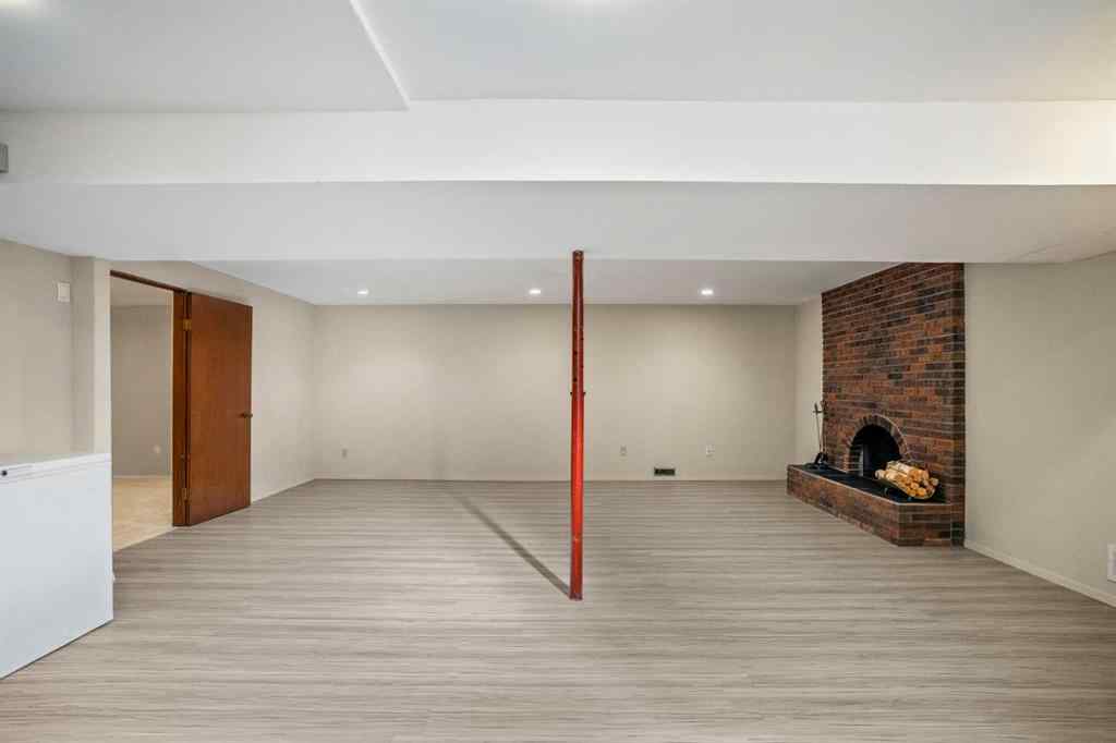 MLS® A2267532 - 827 Lake Emerald Place SE in Lake Bonavista Calgary, Residential