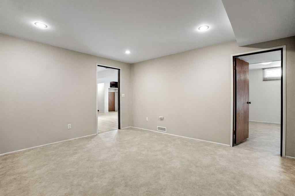 MLS® A2267532 - 827 Lake Emerald Place SE in Lake Bonavista Calgary, Residential