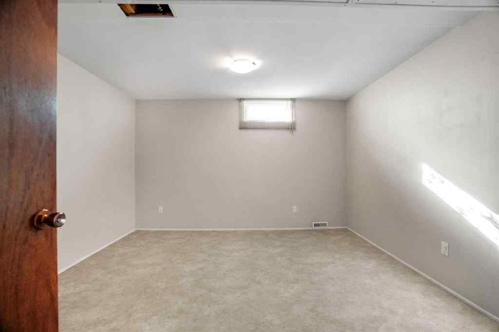 MLS® A2267532 - 827 Lake Emerald Place SE in Lake Bonavista Calgary, Residential