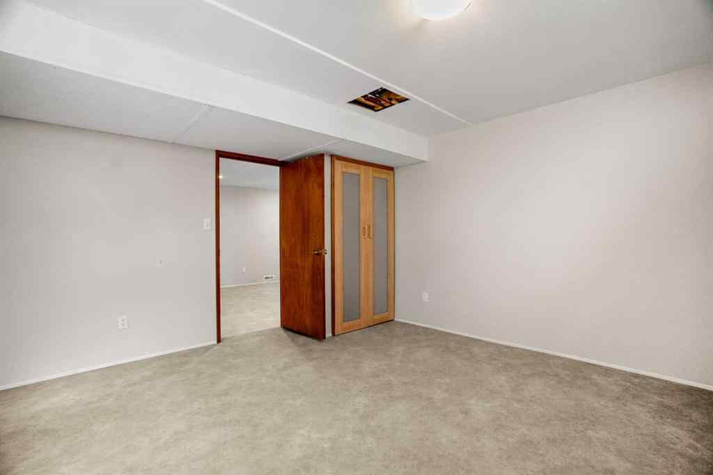 MLS® A2267532 - 827 Lake Emerald Place SE in Lake Bonavista Calgary, Residential