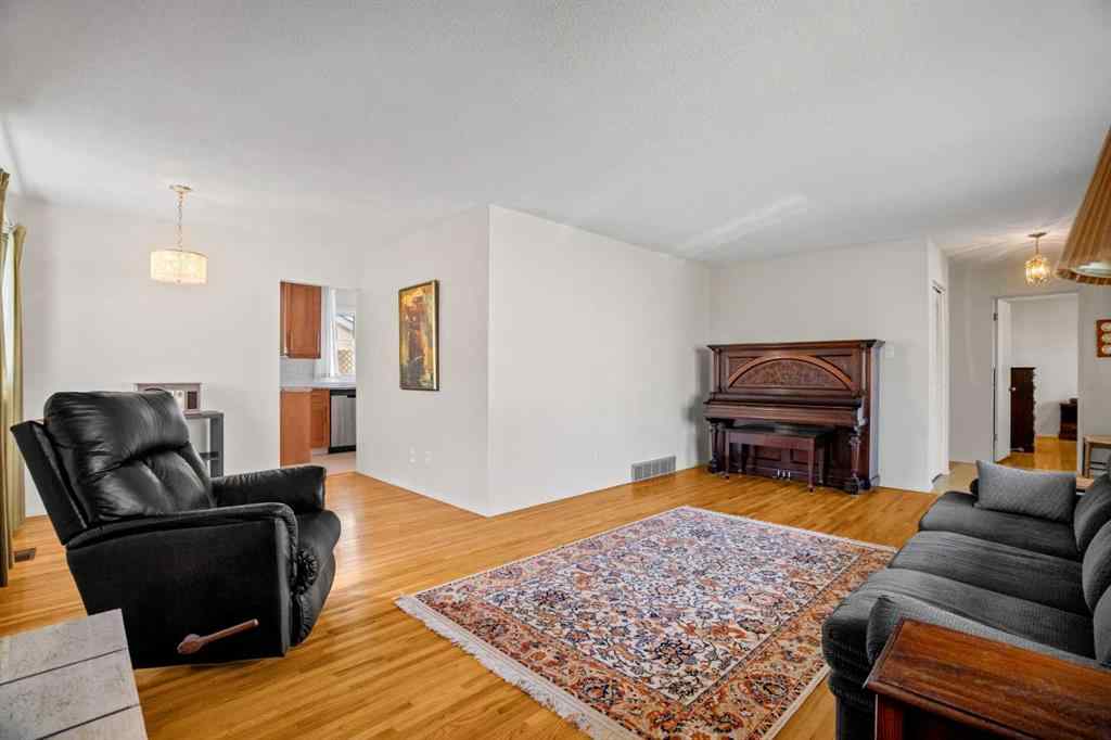 MLS® A2267532 - 827 Lake Emerald Place SE in Lake Bonavista Calgary, Residential