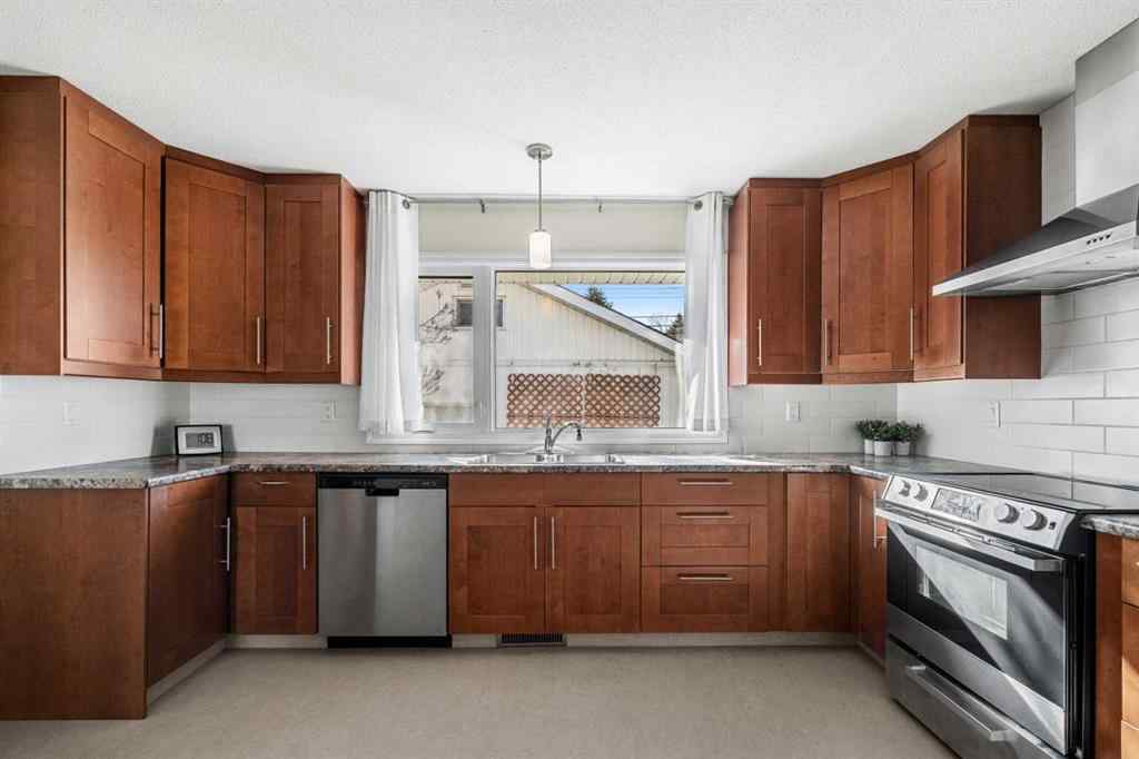 MLS® A2267532 - 827 Lake Emerald Place SE in Lake Bonavista Calgary, Residential