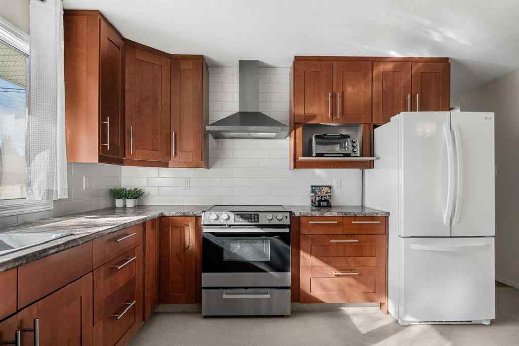 MLS® A2267532 - 827 Lake Emerald Place SE in Lake Bonavista Calgary, Residential