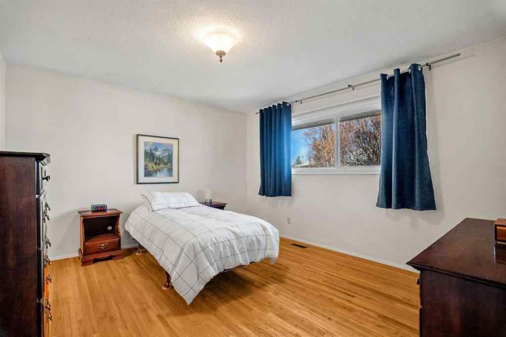 MLS® A2267532 - 827 Lake Emerald Place SE in Lake Bonavista Calgary, Residential