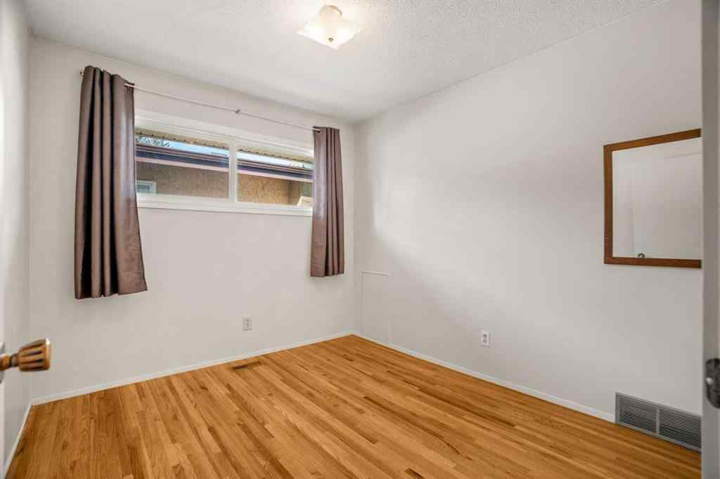 MLS® A2267532 - 827 Lake Emerald Place SE in Lake Bonavista Calgary, Residential