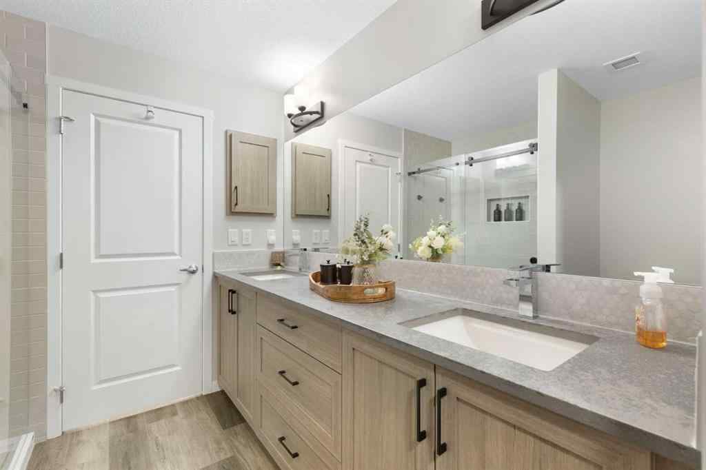 MLS® A2267551 - Unit #1409 42 Cranbrook Gardens SE in Cranston Calgary, Residential