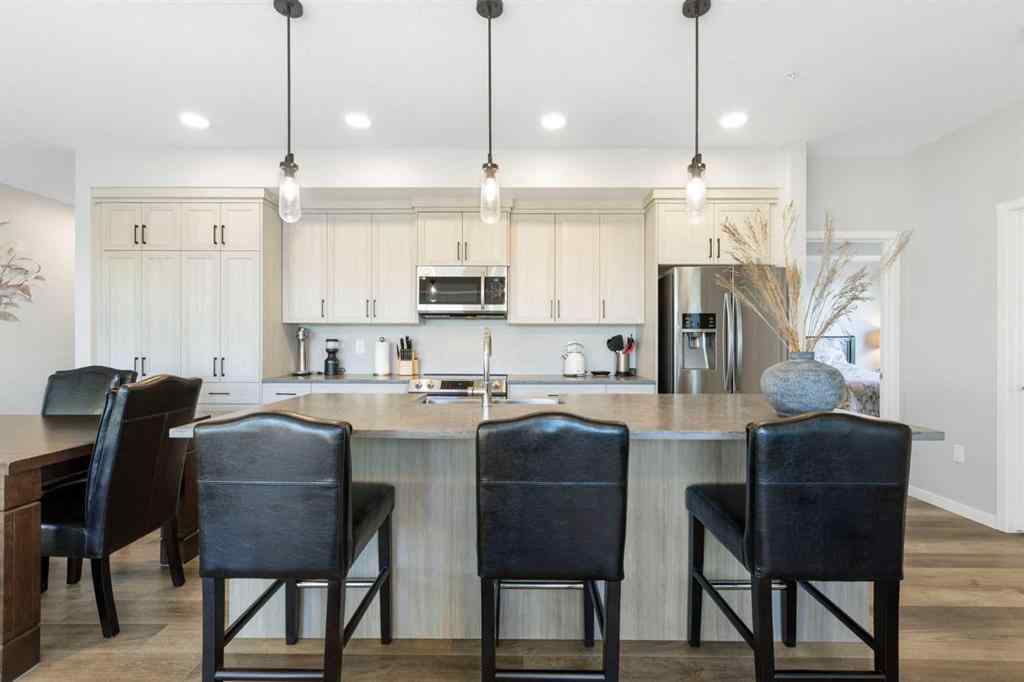 MLS® A2267551 - Unit #1409 42 Cranbrook Gardens SE in Cranston Calgary, Residential