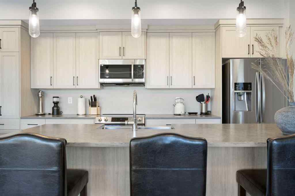 MLS® A2267551 - Unit #1409 42 Cranbrook Gardens SE in Cranston Calgary, Residential