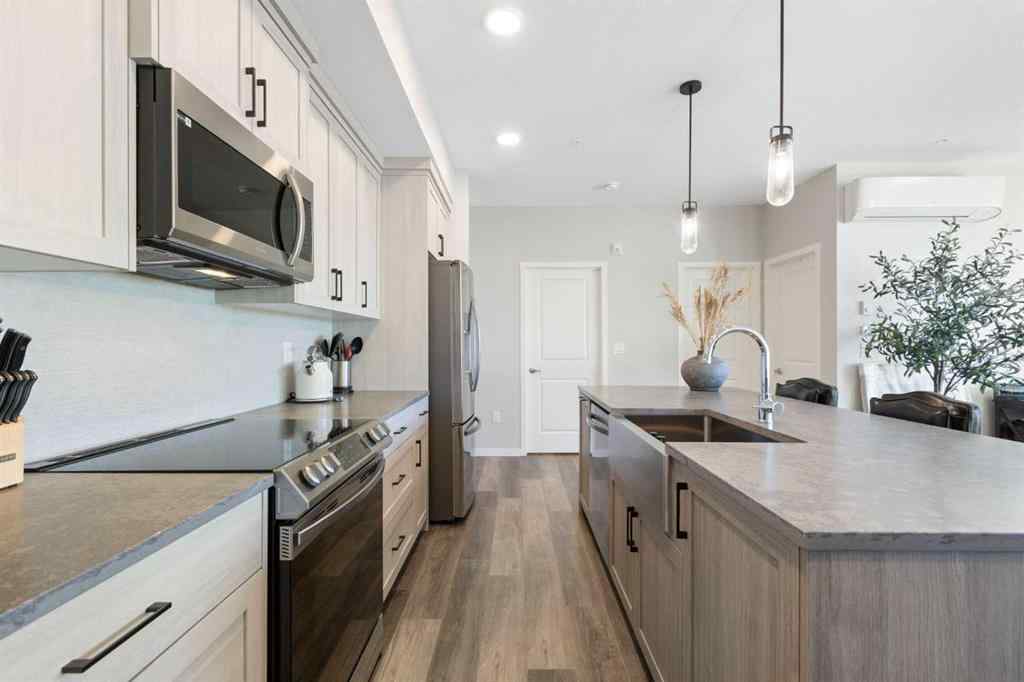 MLS® A2267551 - Unit #1409 42 Cranbrook Gardens SE in Cranston Calgary, Residential