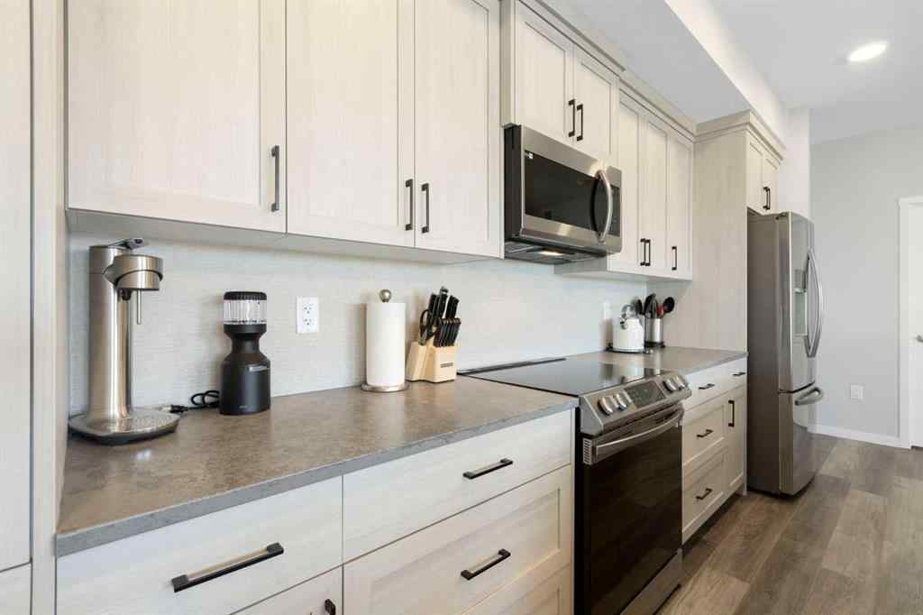 MLS® A2267551 - Unit #1409 42 Cranbrook Gardens SE in Cranston Calgary, Residential