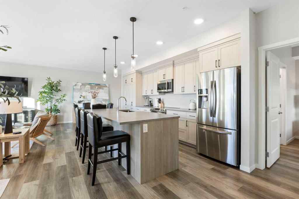 MLS® A2267551 - Unit #1409 42 Cranbrook Gardens SE in Cranston Calgary, Residential