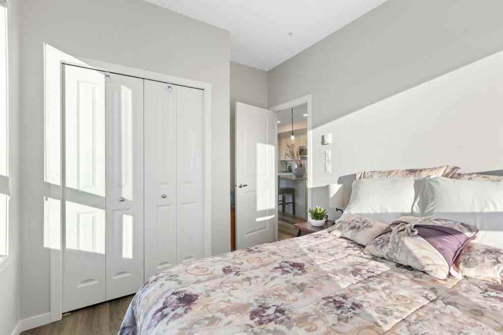 MLS® A2267551 - Unit #1409 42 Cranbrook Gardens SE in Cranston Calgary, Residential