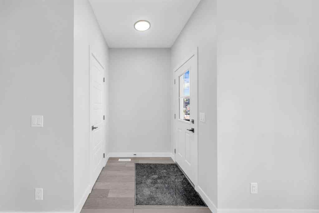 MLS® A2267569 - 27 Amblefield Avenue NW in Moraine Calgary, Residential