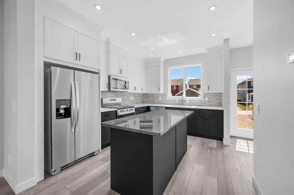 MLS® A2267569 - 27 Amblefield Avenue NW in Moraine Calgary, Residential