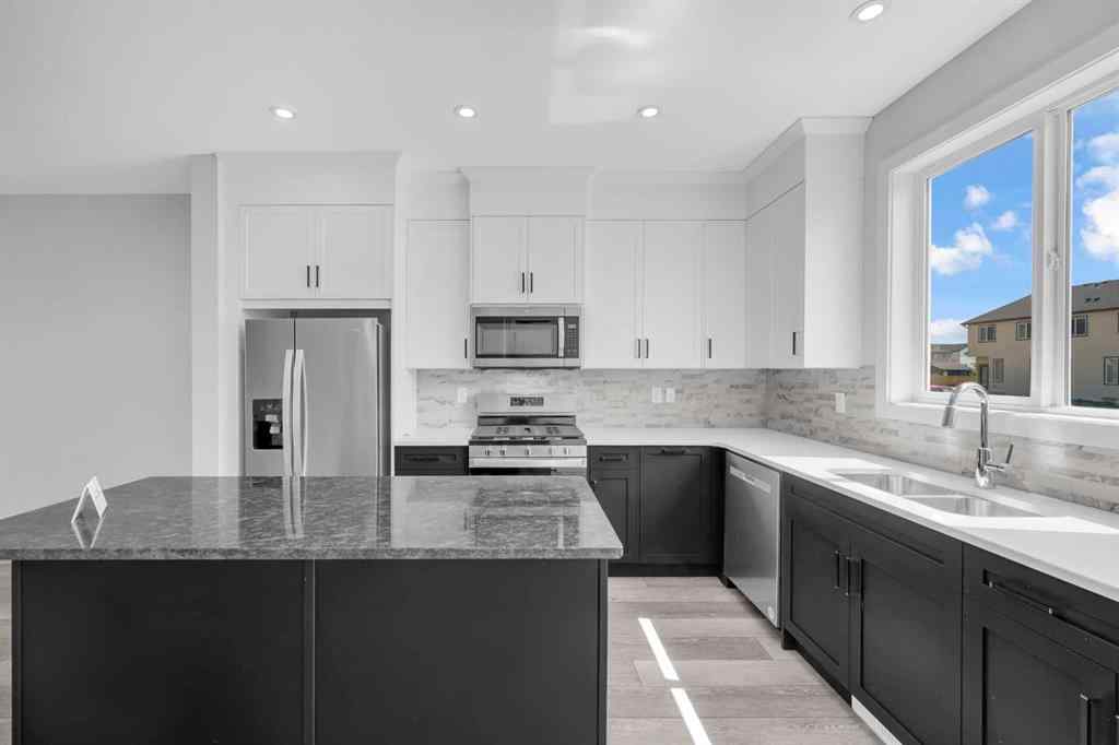 MLS® A2267569 - 27 Amblefield Avenue NW in Moraine Calgary, Residential