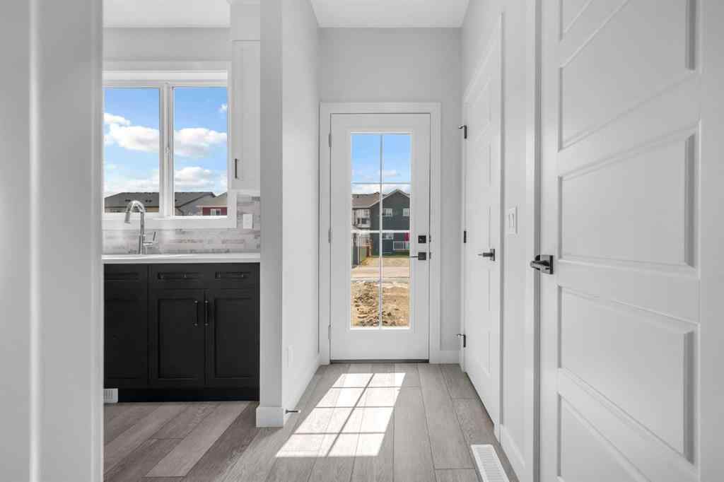 MLS® A2267569 - 27 Amblefield Avenue NW in Moraine Calgary, Residential