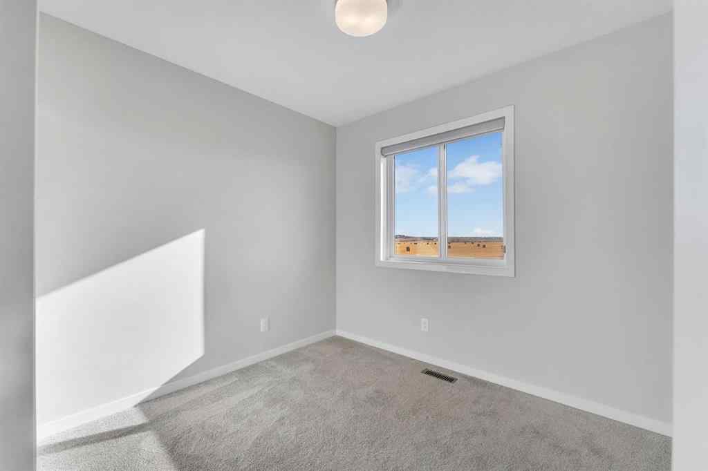 MLS® A2267574 - 800 South Point Heath SW in South Point Airdrie, Residential