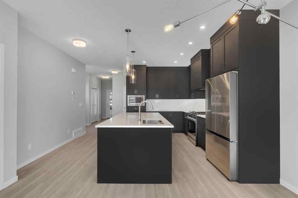 MLS® A2267574 - 800 South Point Heath SW in South Point Airdrie, Residential