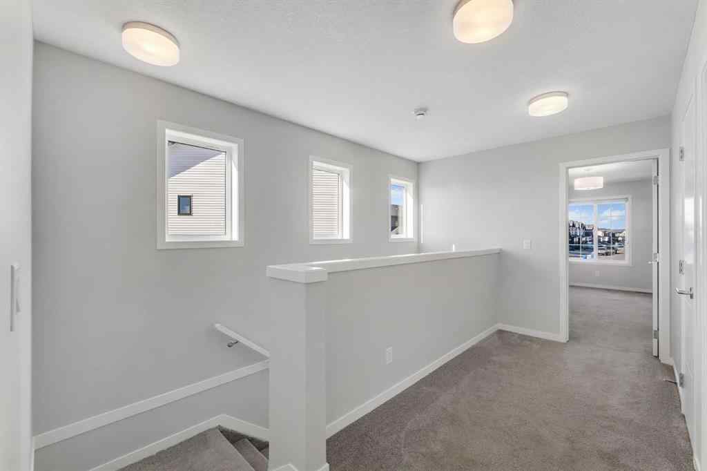 MLS® A2267574 - 800 South Point Heath SW in South Point Airdrie, Residential