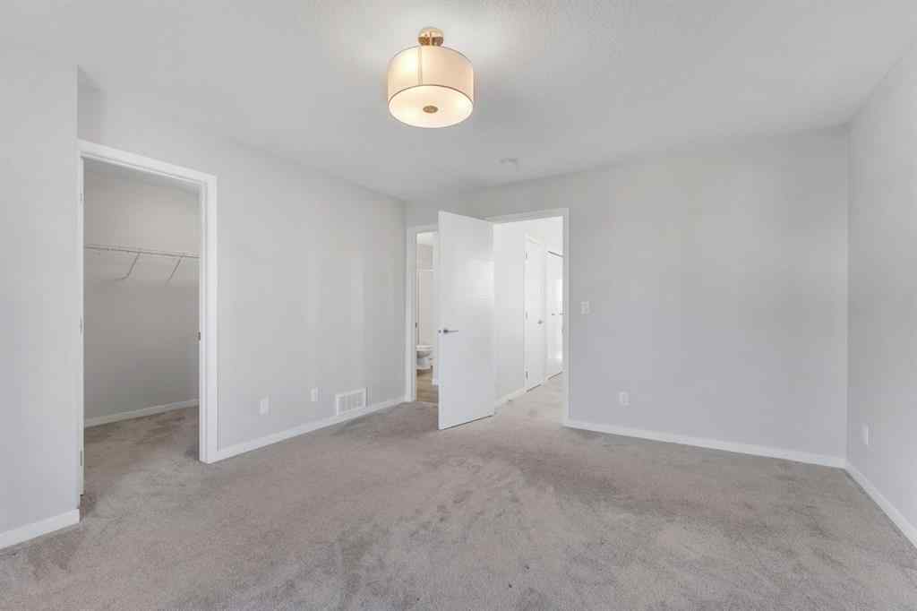 MLS® A2267574 - 800 South Point Heath SW in South Point Airdrie, Residential