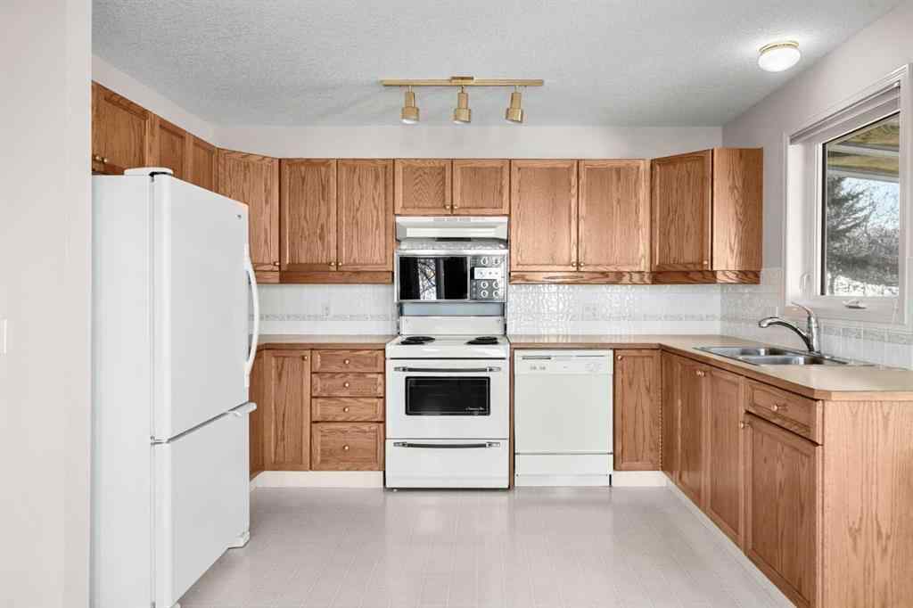 MLS® A2267612 - 634 Sheep River Mews  in Sheep River Ridge Okotoks, Residential