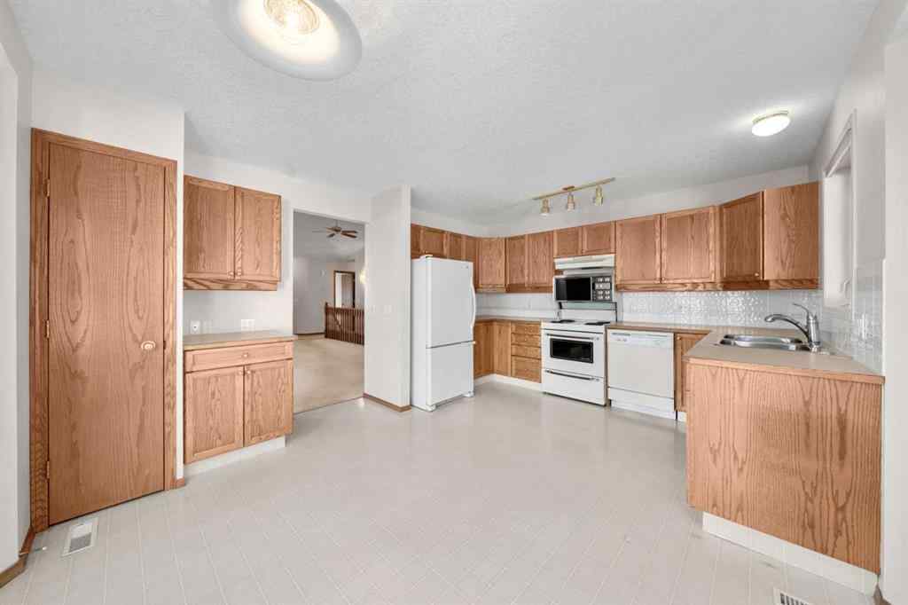 MLS® A2267612 - 634 Sheep River Mews  in Sheep River Ridge Okotoks, Residential