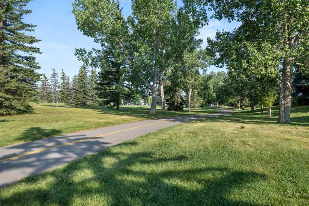 MLS® A2267618 - 150 Shawmeadows Road SW in Shawnessy Calgary, Residential