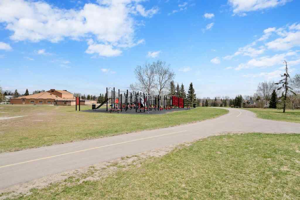 MLS® A2267618 - 150 Shawmeadows Road SW in Shawnessy Calgary, Residential