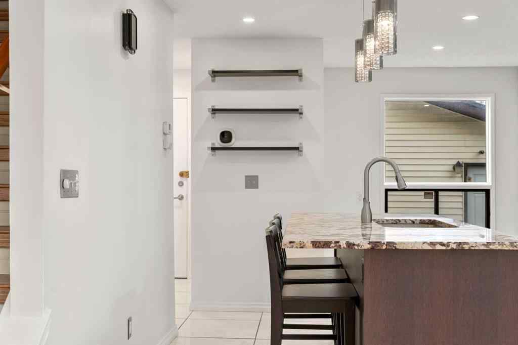 MLS® A2267618 - 150 Shawmeadows Road SW in Shawnessy Calgary, Residential