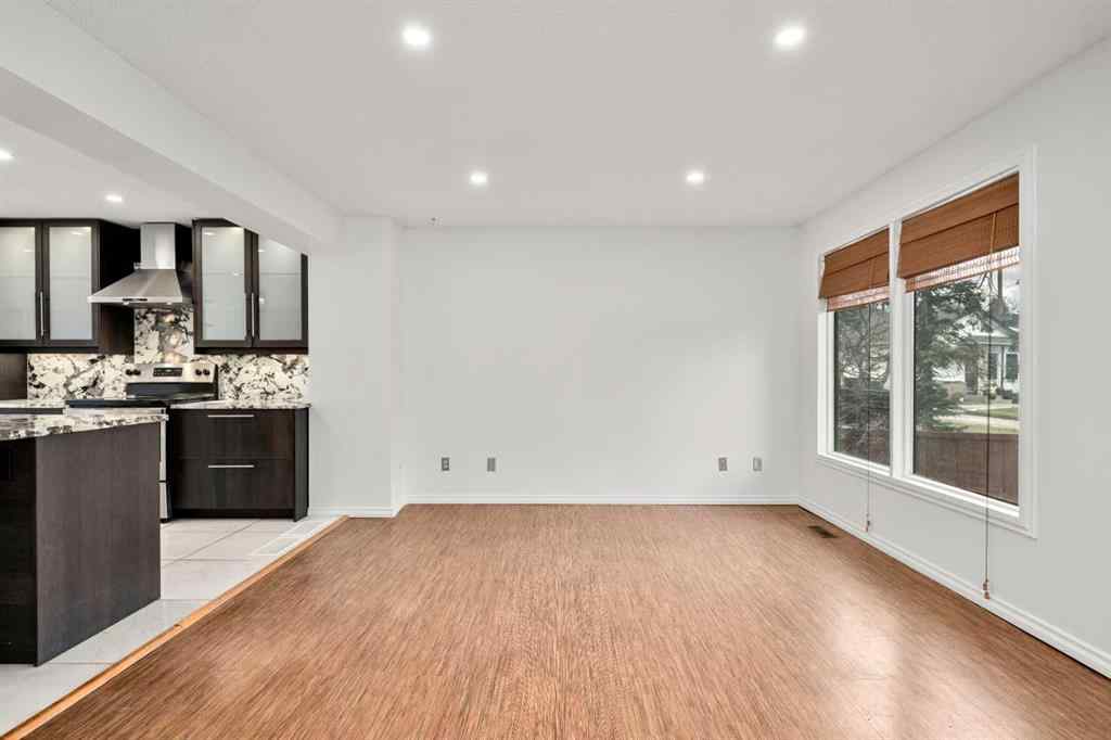 MLS® A2267618 - 150 Shawmeadows Road SW in Shawnessy Calgary, Residential