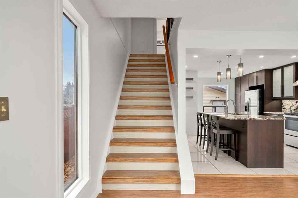 MLS® A2267618 - 150 Shawmeadows Road SW in Shawnessy Calgary, Residential