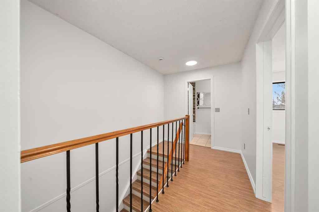 MLS® A2267618 - 150 Shawmeadows Road SW in Shawnessy Calgary, Residential